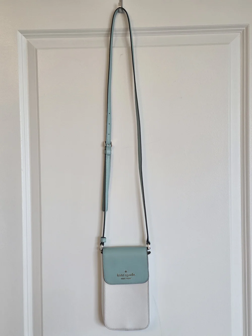 Kate Spade New York Cameron phone crossbody in a light blue and white colorblock